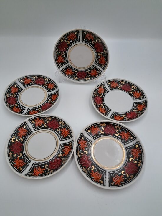 Apakštases d=12cm, no retās kolekcionējamās kafijas servīzes "Aija-2" ar granātābolu puķēm uz melna fona un zeltu, RPR (Aija-2 kaf 74)